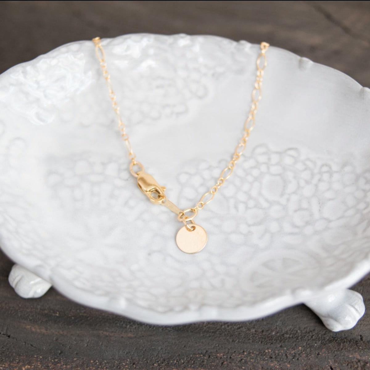 Druzy pendant with 24k gold electroplated edges on a 14k gold-filled oval long/short chain with personalized initial disc at clasp