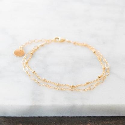 Double layer chain bracelet with personalized initial disc charm in 14k gold-fill