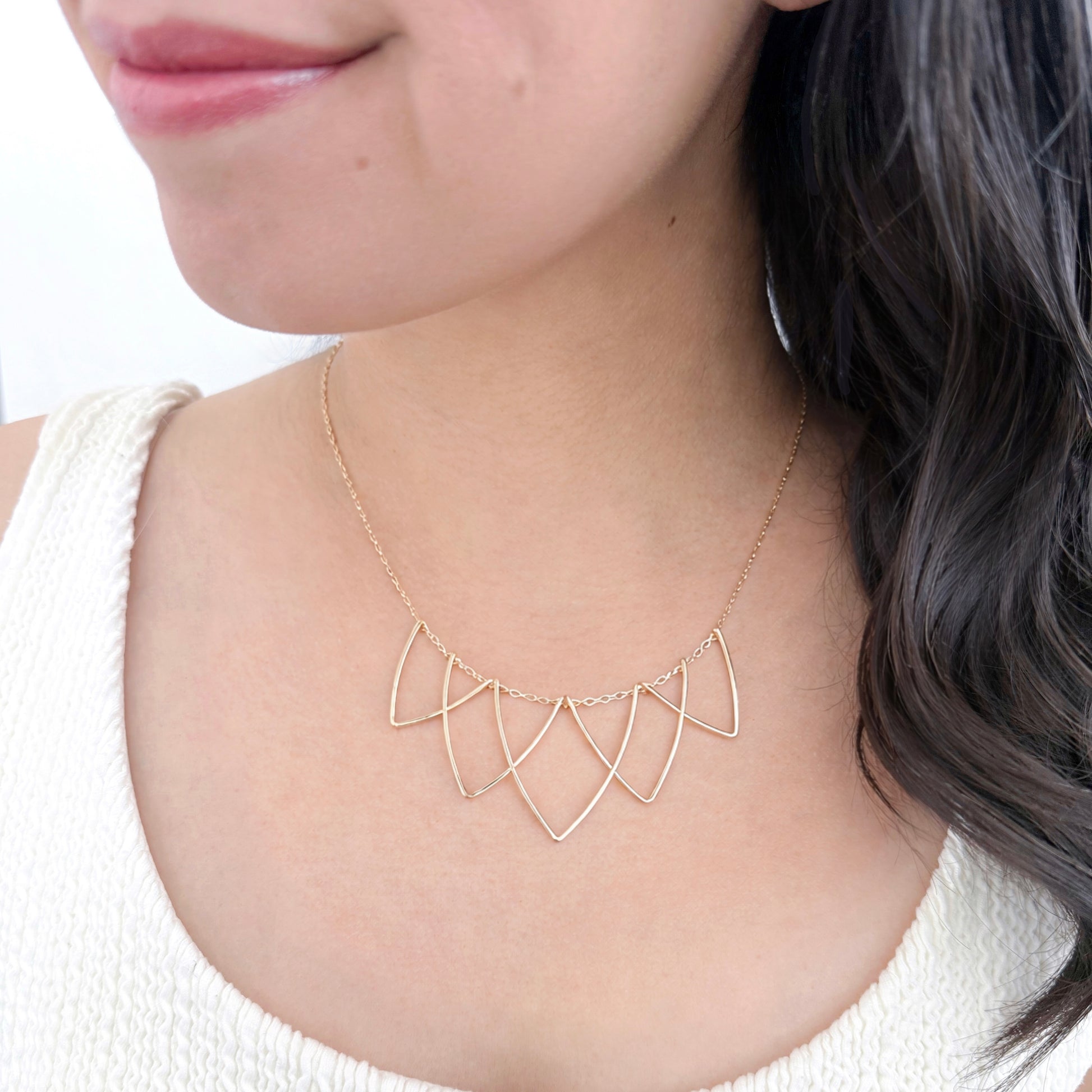 Sophisticated Hilary Curved Triangle Necklace - Geometric Handmade Jewelry. Five interlocking hammered V-shaped curved triangle wire necklace in 14k gold-fill materials
