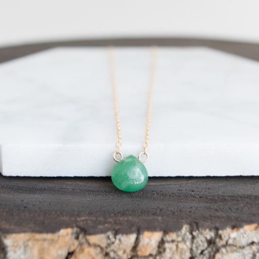 A smooth teardrop-shaped natural green aventurine bead is suspended on a 14k gold-filled or sterling silver wire