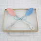 Personalized colorful baby spoon set. Set comes with two spoons that are hand stamped with baby name of choice. Spoon comes with heart cut out at end of handle.