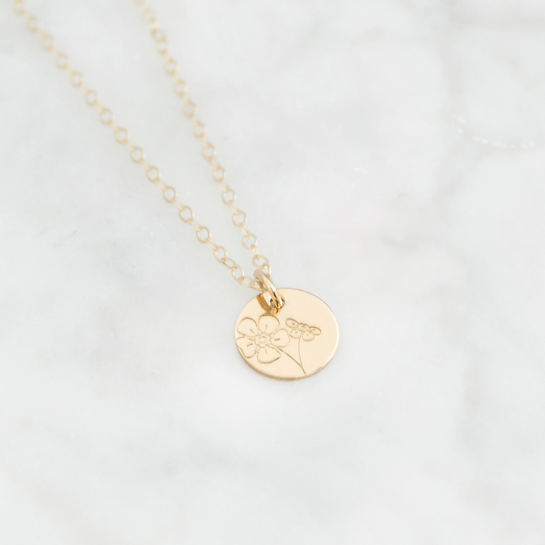 Floral Minima hand stamped 3/8" mini disc necklace with various flower options to choose from in 14k gold-fill