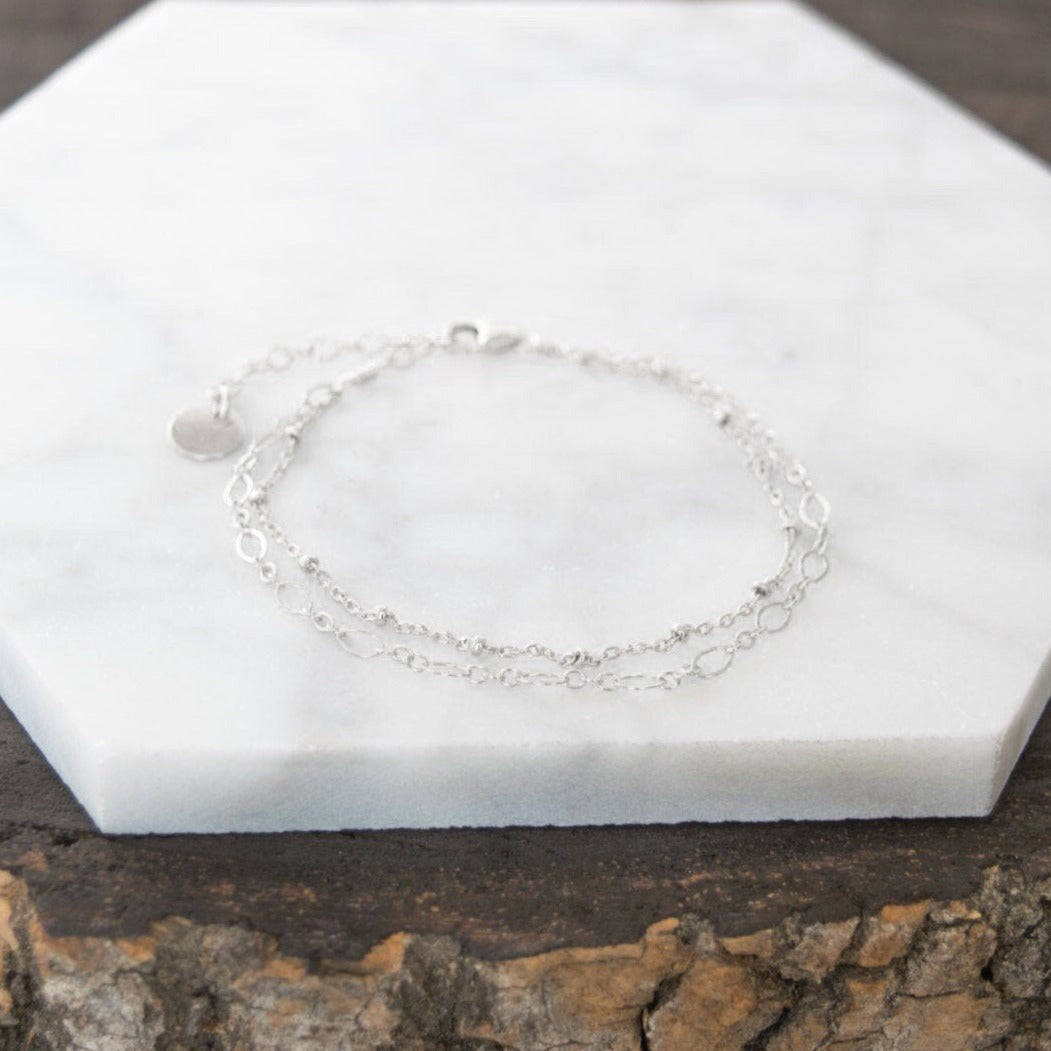 Double layer chain bracelet with personalized initial disc charm in sterling silver