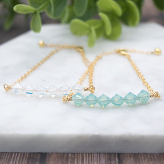 Swarovski Crystal Beaded Bar Bracelet, available in White Opal or Mint Opal bead colors and in 14k Gold-Filled or Sterling Silver chain and findings. Finished with a 1.5 inch extension chain.