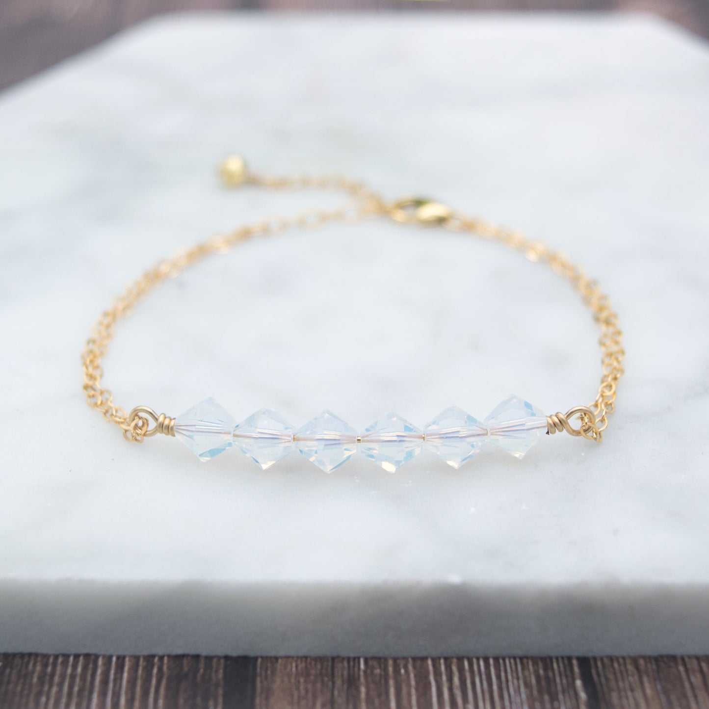 Swarovski Crystal Beaded Bar Bracelet, available in White Opal or Mint Opal bead colors and in 14k Gold-Filled or Sterling Silver chain and findings. Finished with a 1.5 inch extension chain.