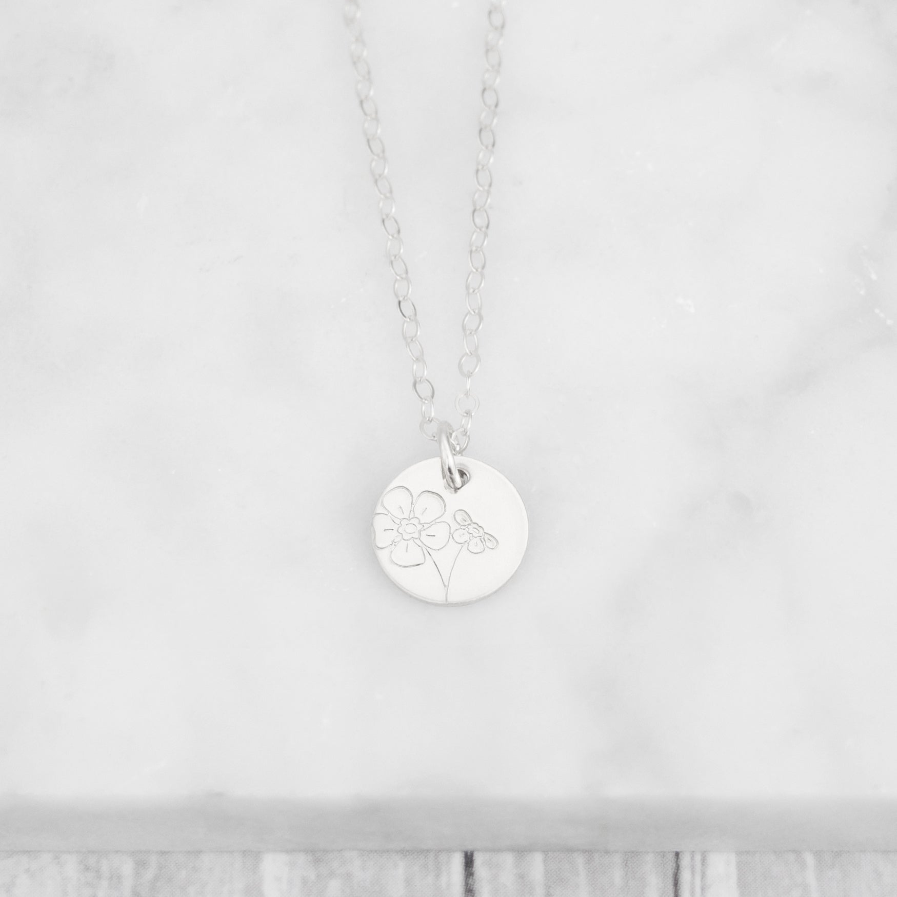 Floral Minima hand stamped 3/8" mini disc necklace with 6 flower options to choose from in sterling silver