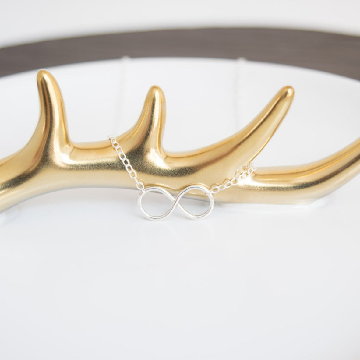 Tiny, hand formed 14k gold-filled or sterling silver infinity connector on a cable chain, with choice of sterling silver or 14k gold-filled chain to mix and match.